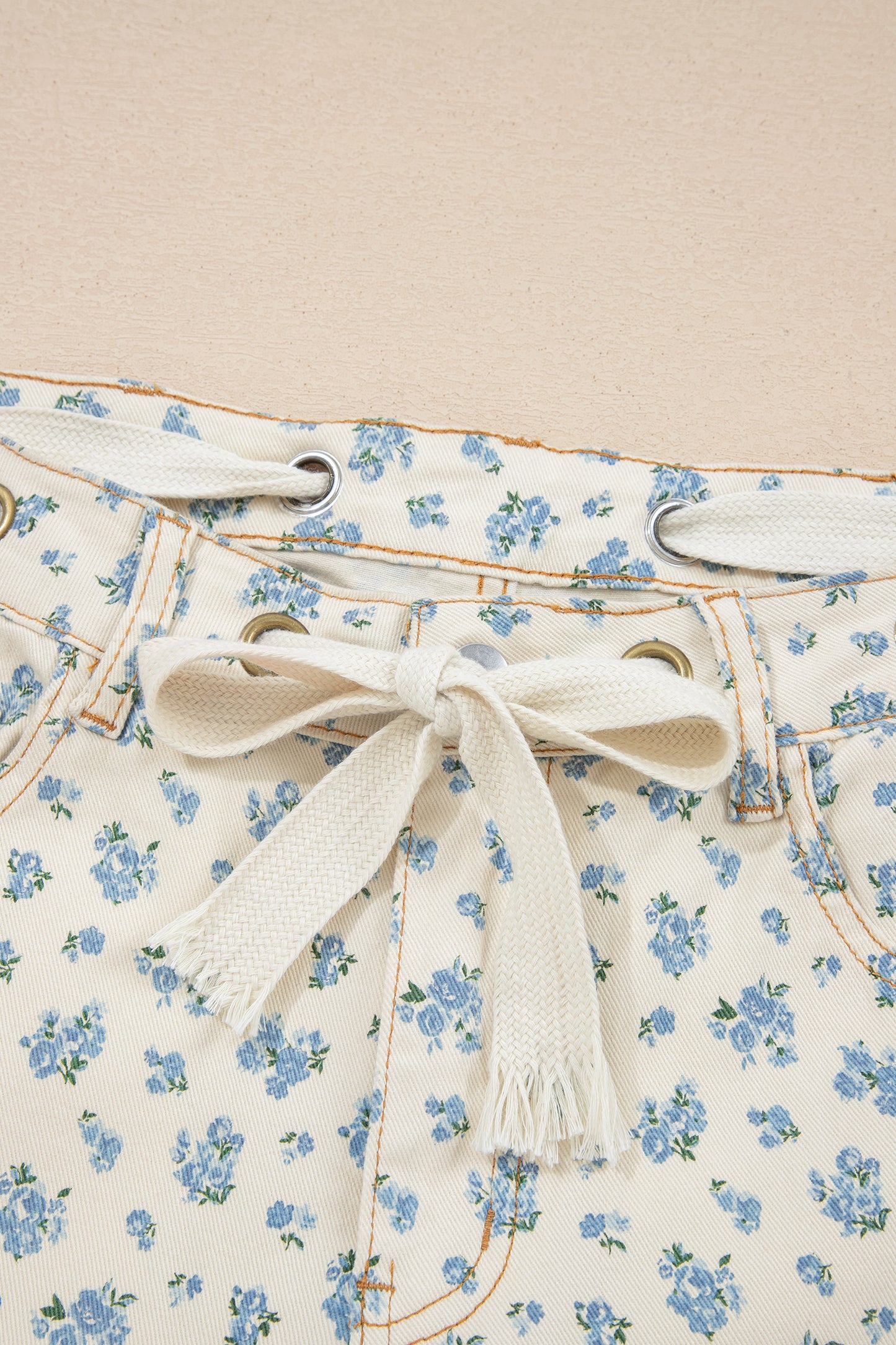 Floral Grommet Tie Waist Jeans